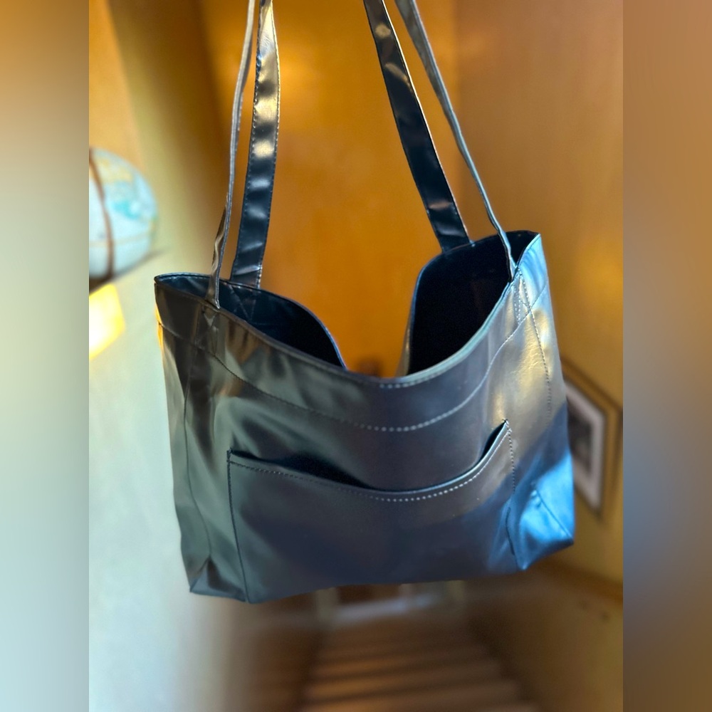 Selling 3 tote bags for $50. ALL THREE! 1-black, 1-redish/tan, 1- rich brown.